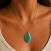 Kustbeweging - RVS ketting met uniek glas hanger