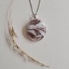 Rozenzwaai - RVS ketting met uniek glas hanger
