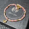 RVS Vergulde Armband met Rhodochrosiet & Vlinder 🦋