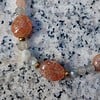 Sun & Moon: ketting met grote zonnestenen en meerkleurige maansteen