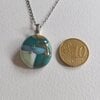 Turkooisstenen - RVS ketting met uniek glas hanger