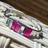 Zilverkleurige armband met roze details