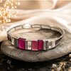 Zilverkleurige armband met roze details