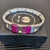 Zilverkleurige armband met roze details