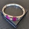 Zilverkleurige armband met roze details