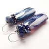 Blauwe agaat oorbellen met lampwork glaskraal in sterling zilver