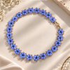 Blauwe Bloemenketting met Goudkleurige Details | Kleurrijke Statement Ketting
