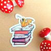 Boek dragon sticker, transparant, vaatwasser proof 4,7x6 cm