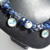 Delftsblauwe ketting met bloemenkralen en oud-Hollandse bedels