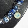 Delftsblauwe ketting met bloemenkralen en oud-Hollandse bedels
