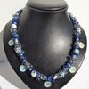 Delftsblauwe ketting met bloemenkralen en oud-Hollandse bedels