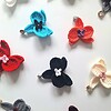 Gehaakte oorbellen | Turquoise en zwart orchidee bloem