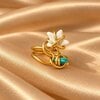Handgemaakte Goudkleurige Ring met Witte Ster en Turquoise Kraal | Boho Spiraalring