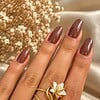 Handgemaakte Goudkleurige Ring met Witte Ster en Turquoise Kraal | Boho Spiraalring