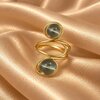 Handgemaakte Goudkleurige Spiraalring met Transparante Lichtblauwe Kralen | Verstelbare Statement Ring
