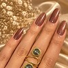 Handgemaakte Goudkleurige Spiraalring met Transparante Lichtblauwe Kralen | Verstelbare Statement Ring