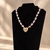 Roze barokparel ketting met vintage hartjeshanger