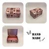 Vintage sieradendoos met oude advertenties