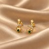 Gouden Sterren Oorstekers met Groene CZ Steentjes – 925 Sterling Zilver 18K Gold Plated | Cleopatra's World