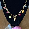 Goudkleurige ketting met verschillende zomerbedels