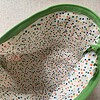 Groen toilettasje / etui van vintage kant en band