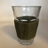 Thee-/koffieglas met sleeve van leer