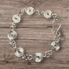 Zilveren armband met zwanenmotief en spiraalvormige schakels