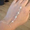 Zilveren parel handketting