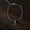 Zilverkleurig armbandje met kleine hanger