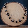 Zwarte Elegantie & Gouden Bloemen, handgeweven ketting met lavasteen en obsidiaan