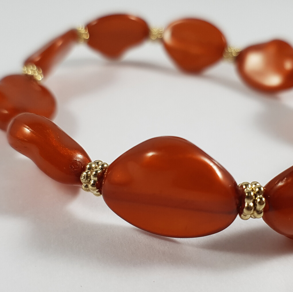 Bruin rood en goud kralen rek armband