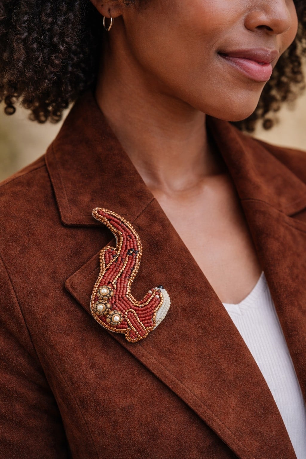 Stroming & Vreugde, kralen geborduurde otter broche