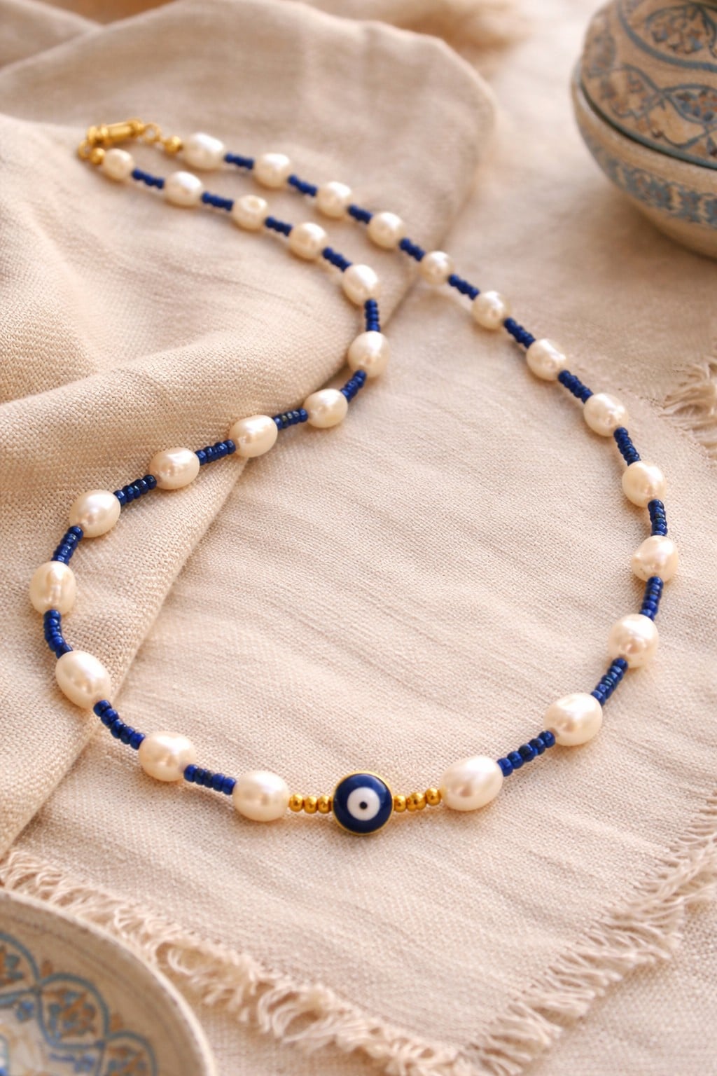 Cheshm-e Aman | ketting met boze oog bescherming en zoetwaterparels