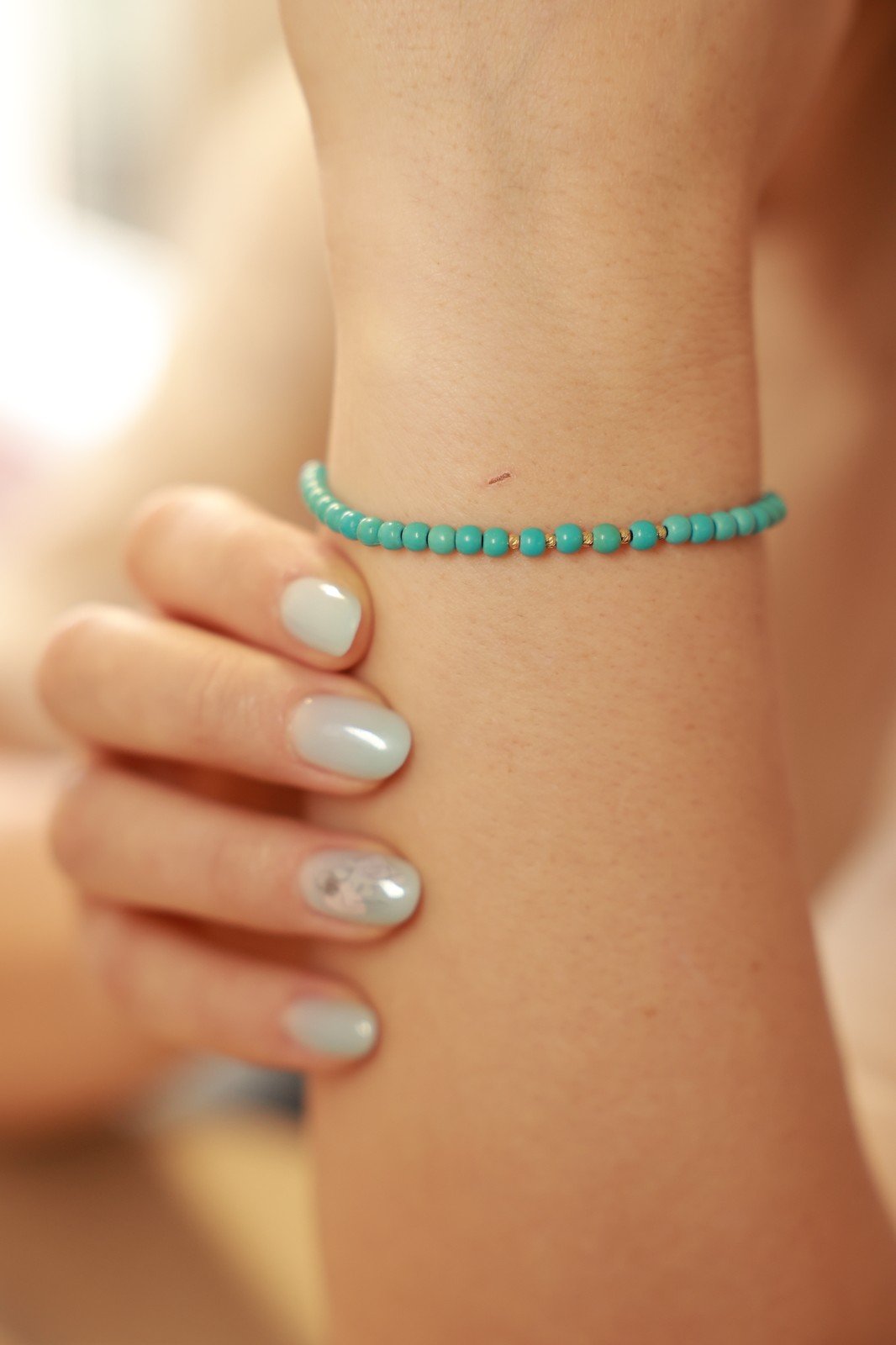 Turkoois armband met 14 karaat geelgouden kralen - 54699.jpeg Turkoois armband met 14 karaat geelgouden kralen