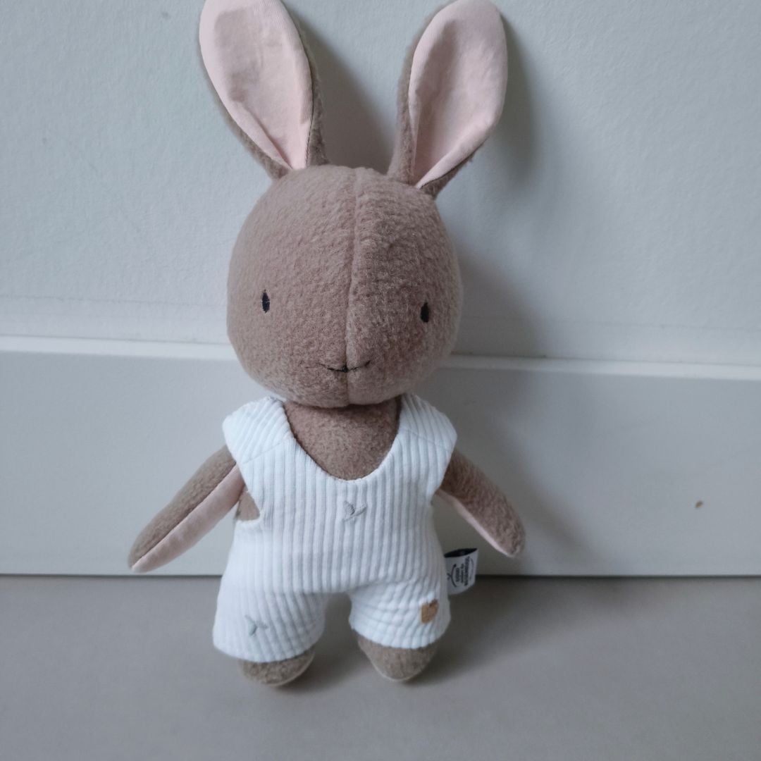 Herinneringshaasje van eerste babykleding