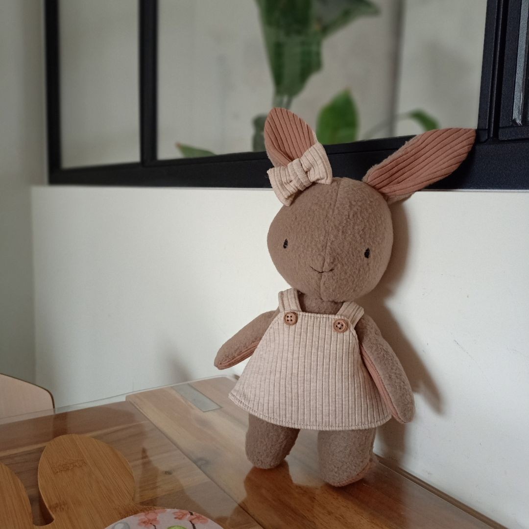 Herinneringshaasje van eerste babykleding