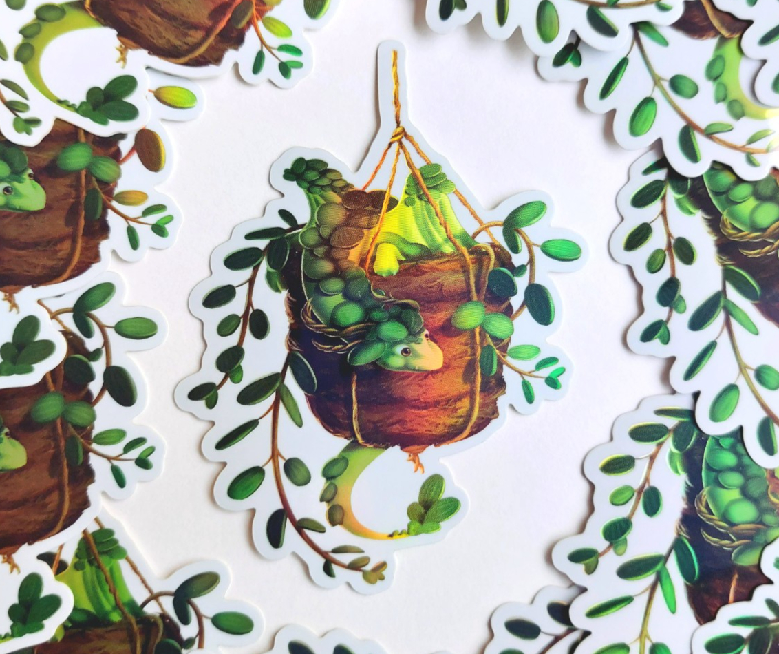 Plantendraak sticker holografisch 4.7x9 cm (1.85x3.45 inch)