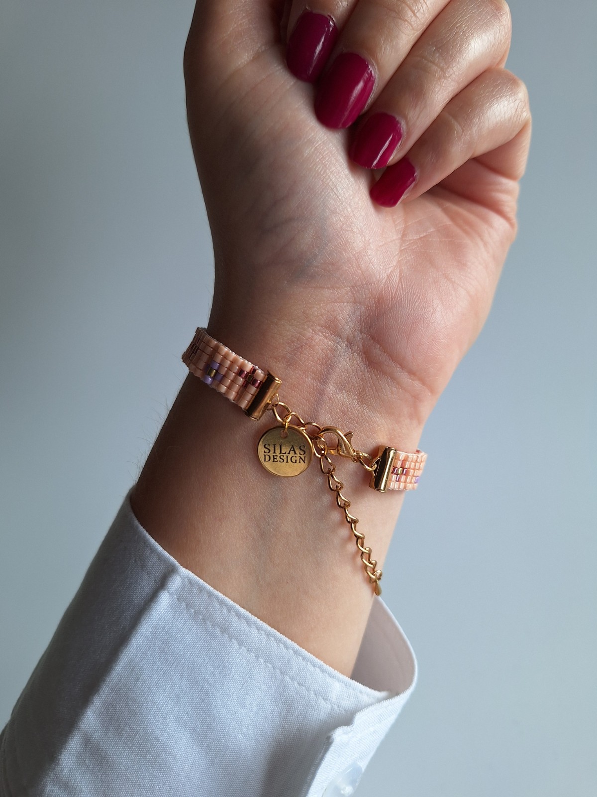 Geweven kralen armband 'Purple flowers' - 47997.jpeg Geweven kralen armband | Paarse bloemen in de oranje weide