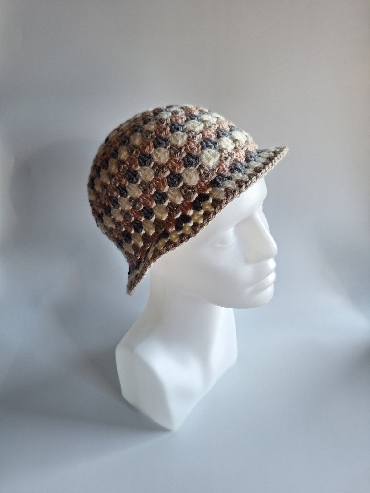 Gehaakte bucket hat | Lichtroze, crème, beige en grijs