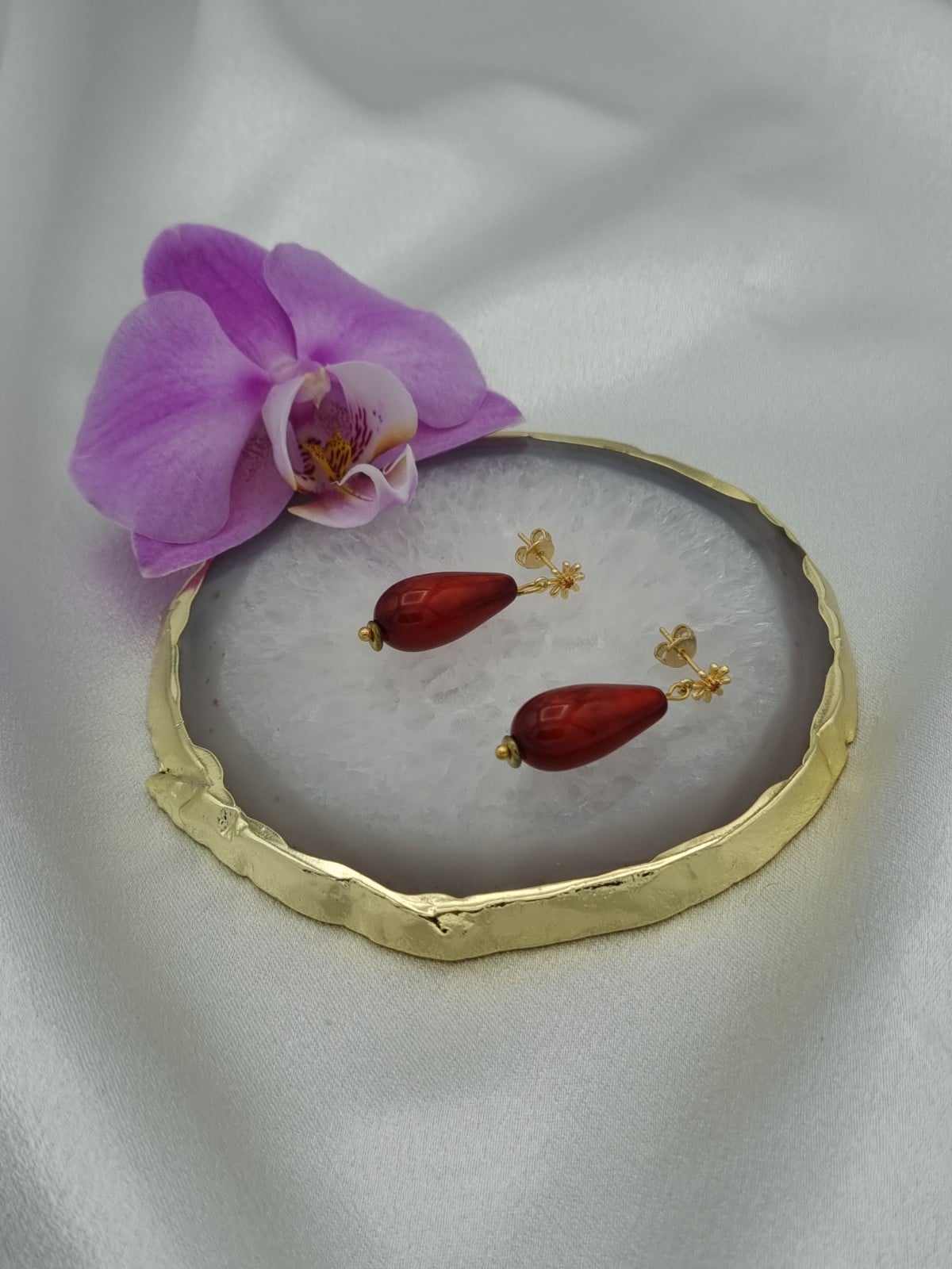 Handgemaakte Polaris oorbellen - bordeaux rood