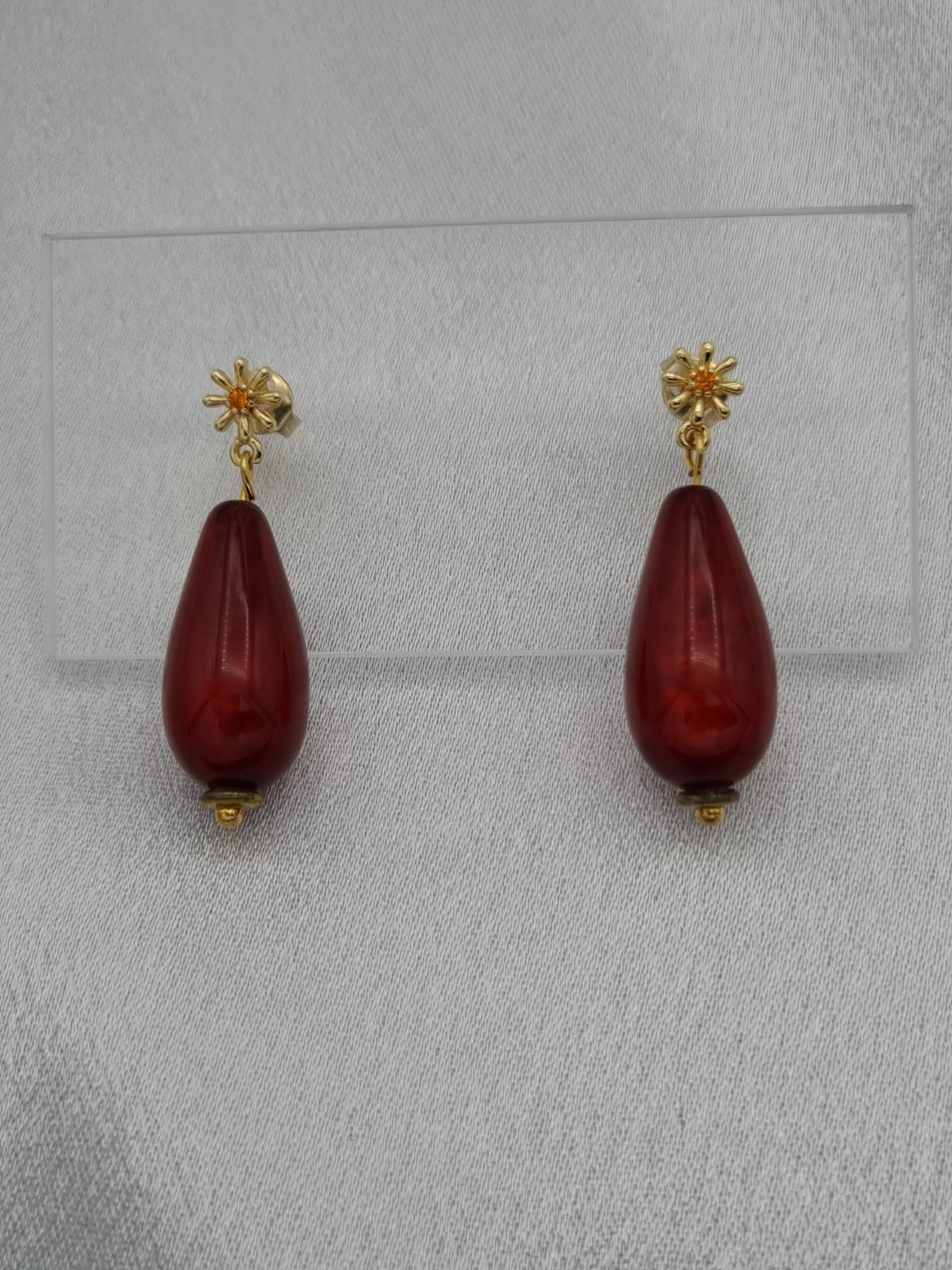 Handgemaakte Polaris oorbellen - bordeaux rood