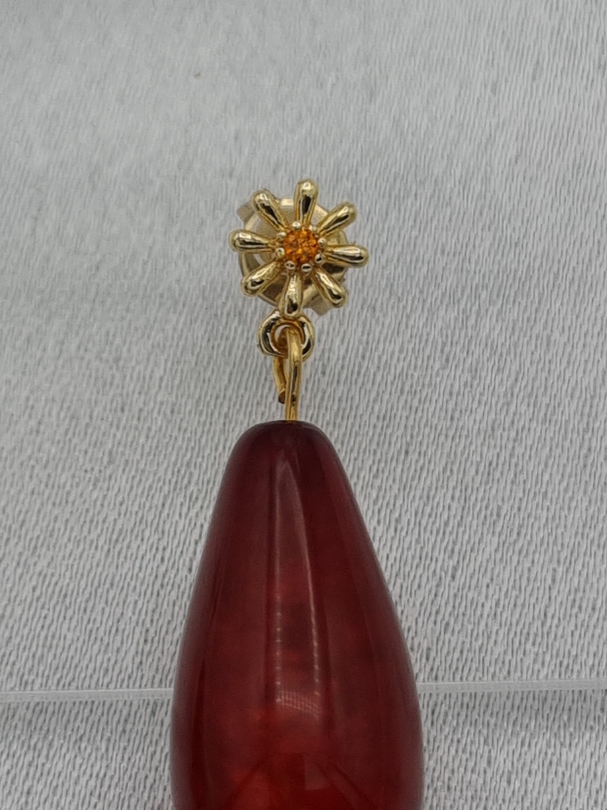 Handgemaakte Polaris oorbellen - bordeaux rood