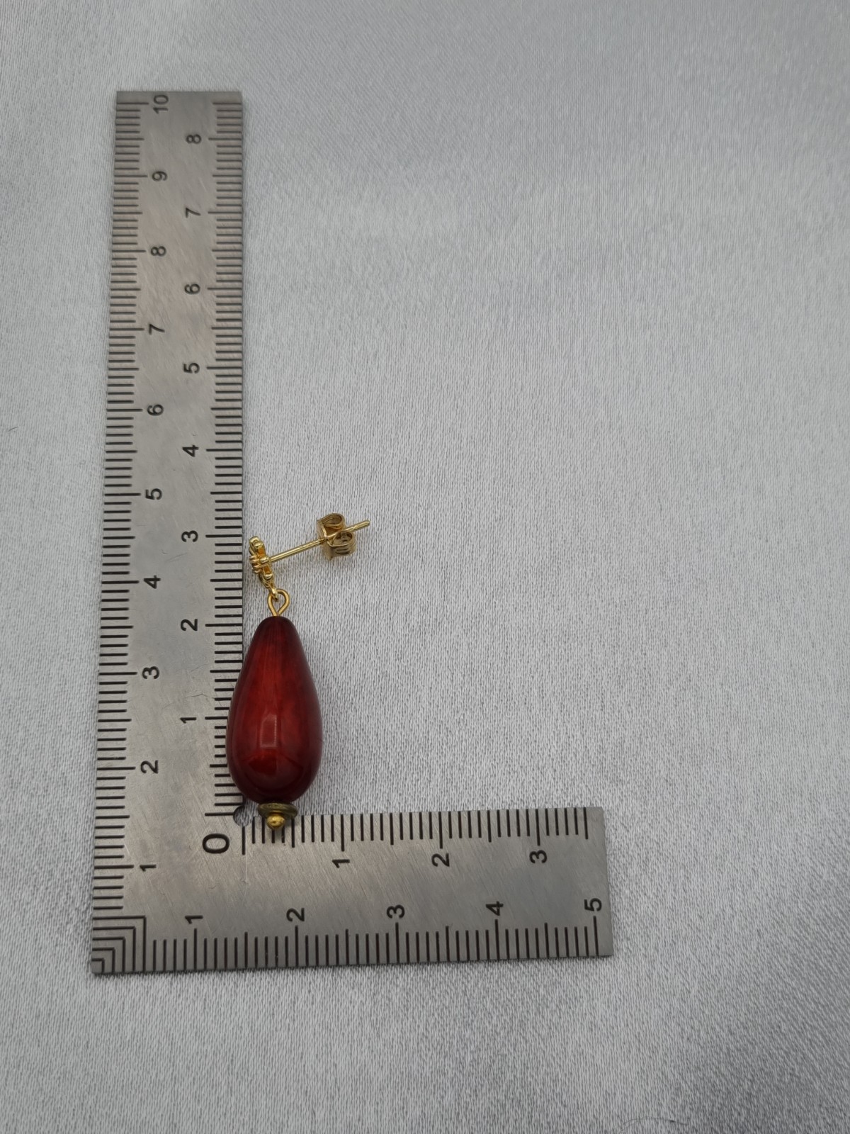 Handgemaakte Polaris oorbellen - bordeaux rood