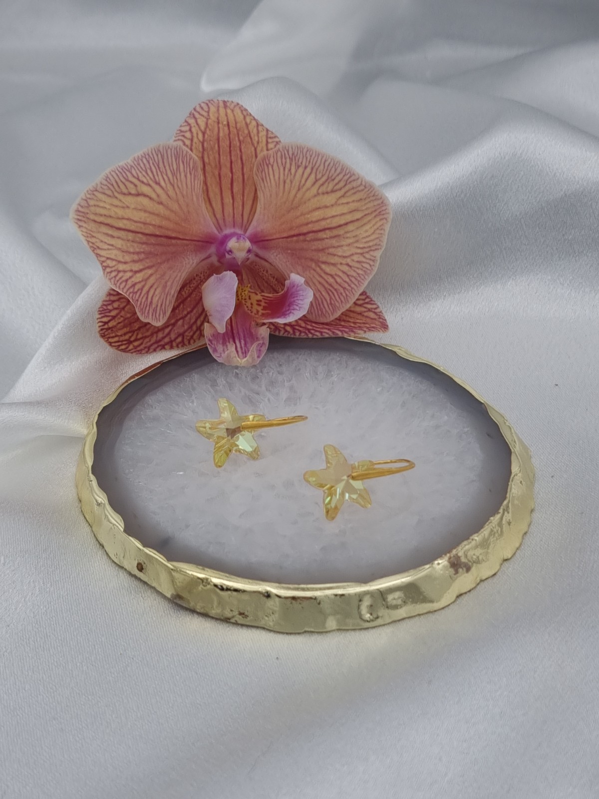 Vergulde oorbellen met kristallen zeester - geel