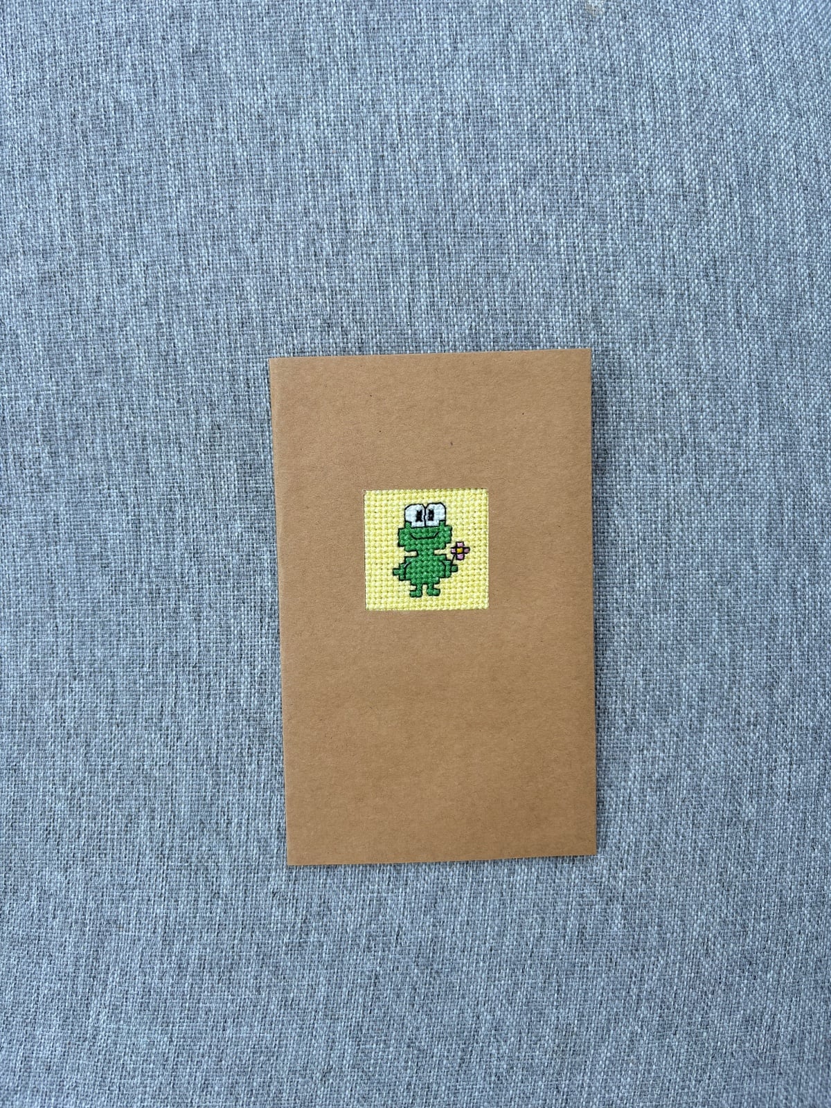 Handgeborduurde wenskaart opkikkertje