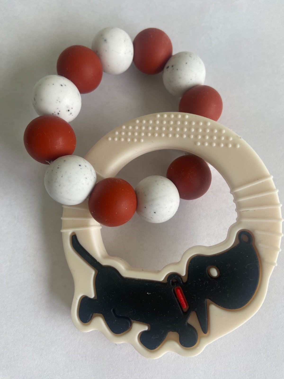 Bijtring Roest- met takkie hanger