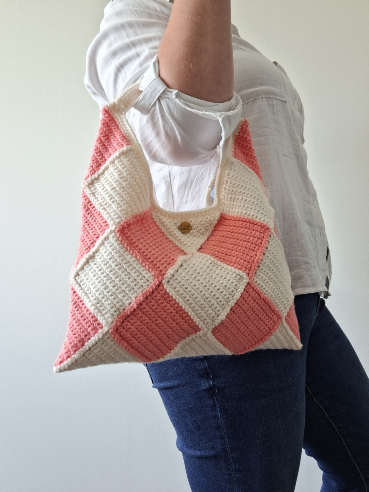 Gehaakte checker handtas 'Crème en koraaloranje'