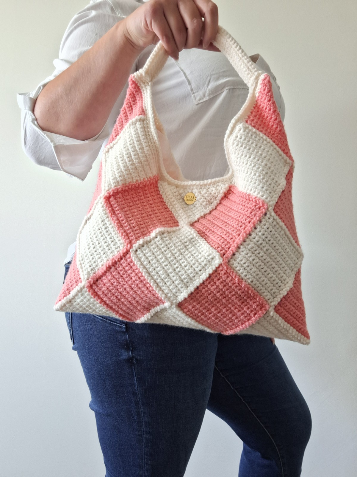 Gehaakte checker handtas 'Crème en koraaloranje'