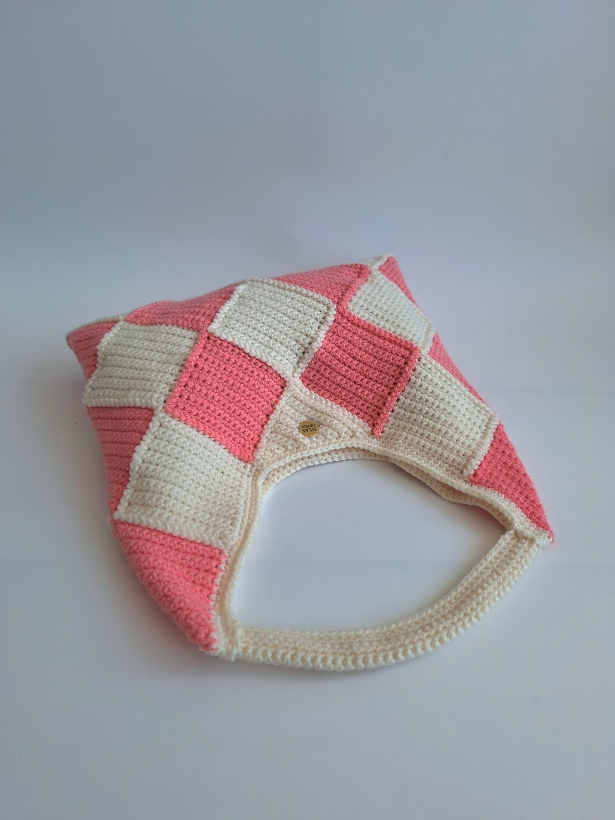 Gehaakte checker handtas 'Crème en koraaloranje'