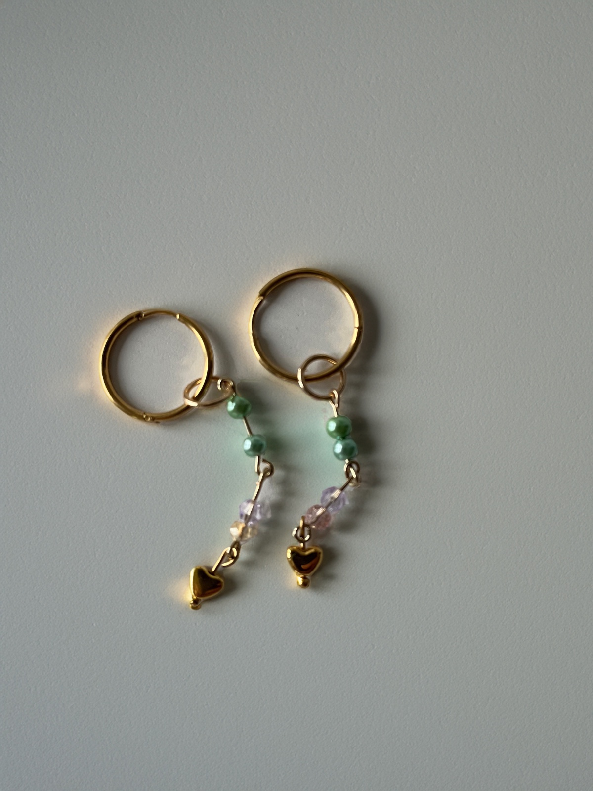 oorbellen met kralen en hartjes